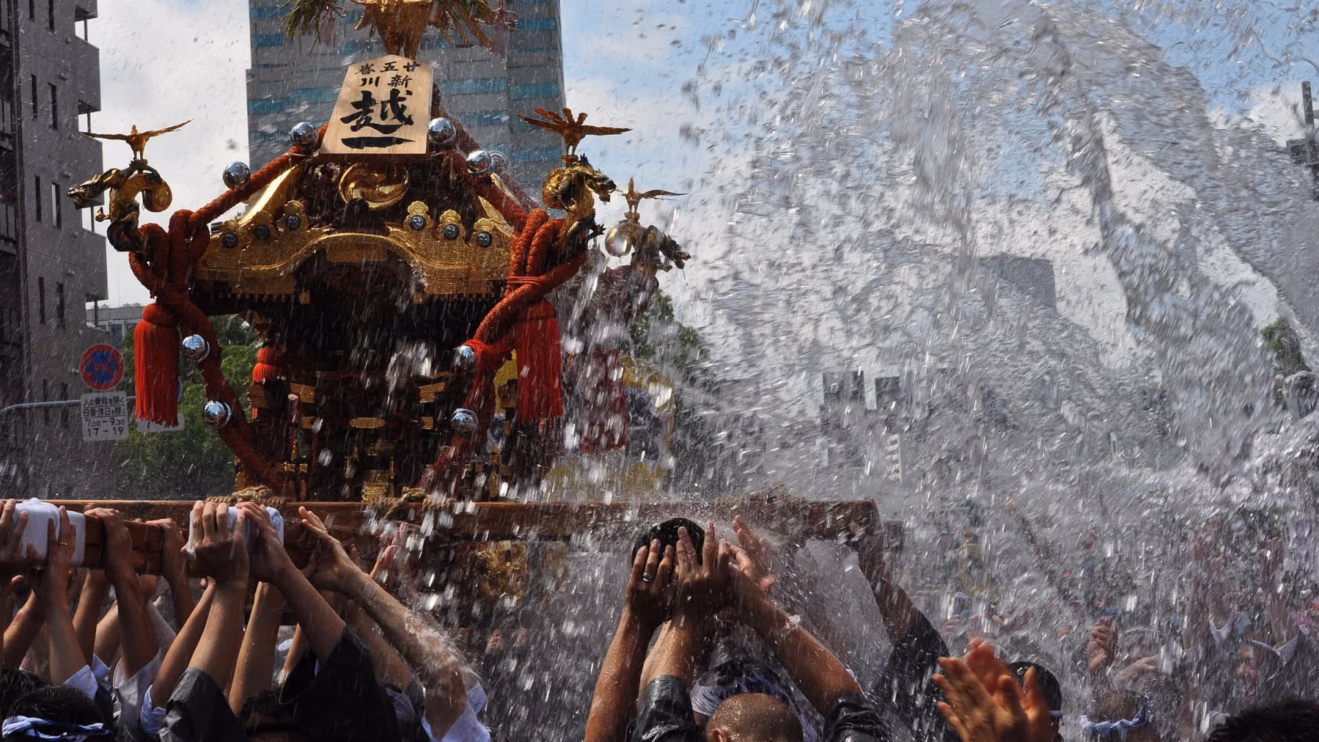 Mizukake Event and a Portable Shrine at the Fukagawa Festival
