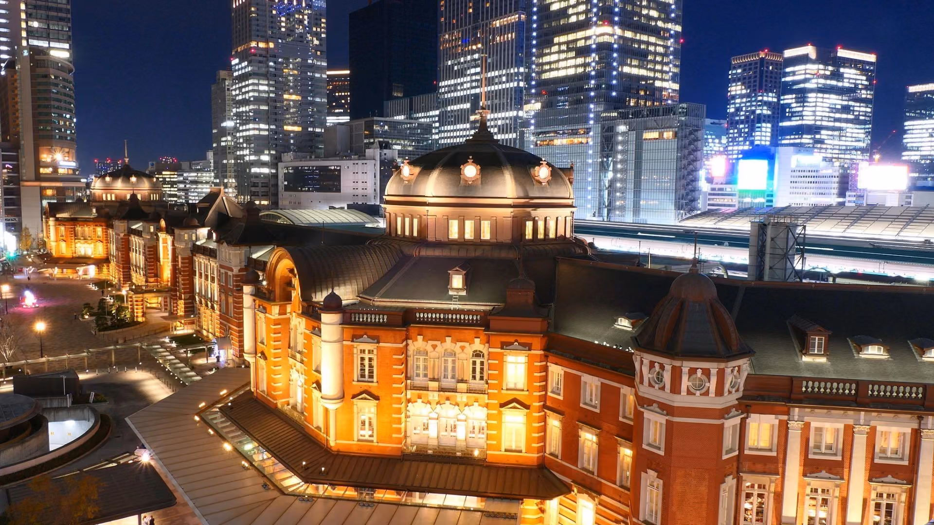 The station building of Tokyo Station at night illuminated.